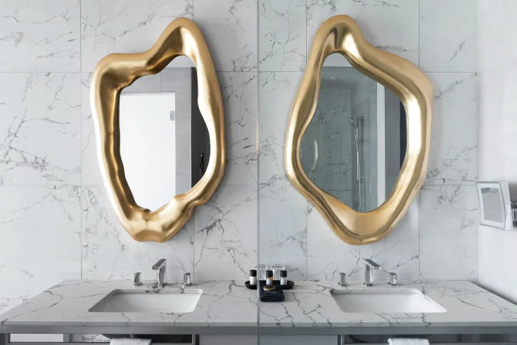 contrasting bathroom mirrors